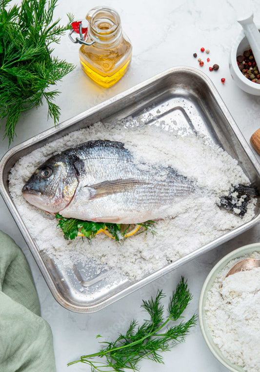 Wolfsbarsch in der Salzkruste mit Koch Mimmo in Schöneberg